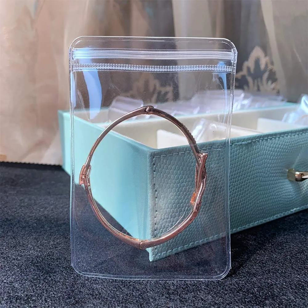 100 Pack PVC Clear Jewelry Anti Oxidation Zipper Bag Antitarnish Plastic Bags for Packaging Jewelry Rings Earrings Transparent Poly Pouch (Light Blue, 2.36×3.14inch)