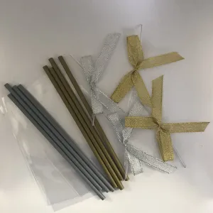 Gold and Silver Cake Pop Sticks, with silver and gold Ribbon Bows", along with 3" x 5" Clear Plastic bags - Qty 50/pack