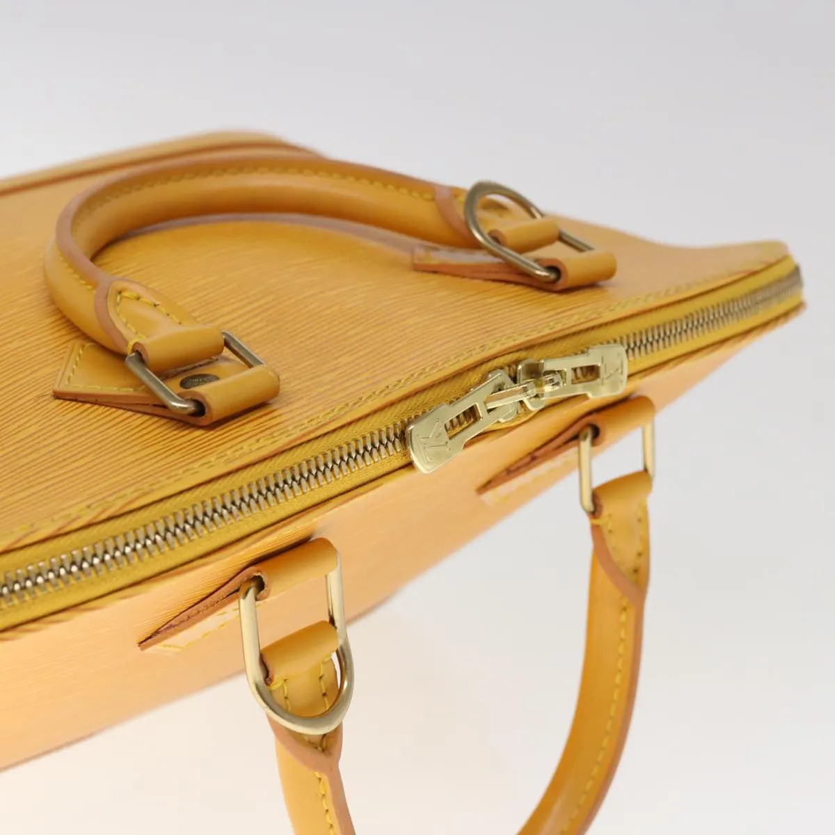 Louis Vuitton Alma  Leather Handbag ()