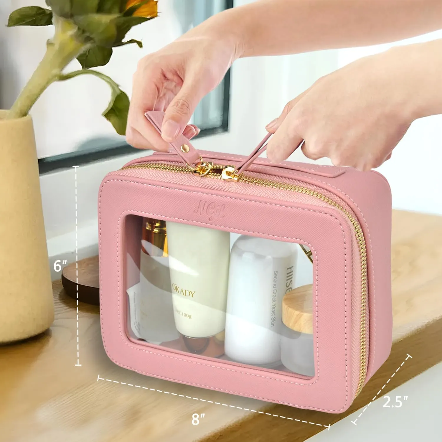 NGIL Clear Faux Leather Travel Toiletry Bag, Makeup Bag Organizer for Women, Clear Window & Gold Zipper Makeup Bag, Road Trip Essential, Skincare, Cruise Ship Essentials (Pink)