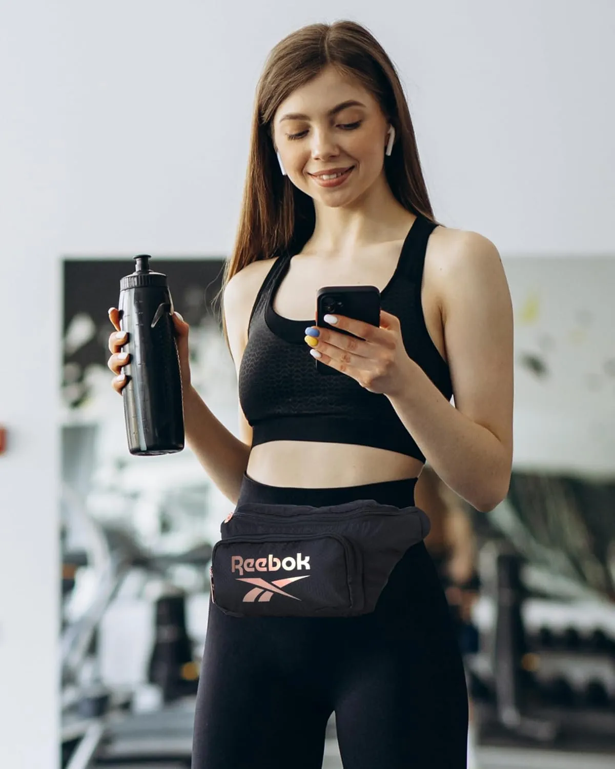Reebok Fanny Pack - Lightweight Stylish Crossbody Waist Belt Bags for Women and Men with Adjustable Strap, Size One Size, Davis Black With Rose Gold Logo