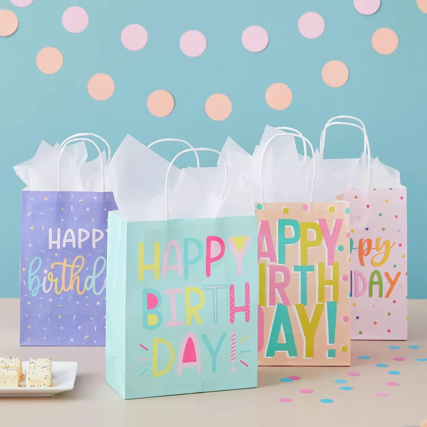 Sparkle and Bash 24 Pack 8 x 10 x 4 Inch Happy Birthday Gift Bags with Handles and 24 Sheets White Tissue Paper, Medium Party Favor Bags for Goodies, Treats, 4 Pastel Colors